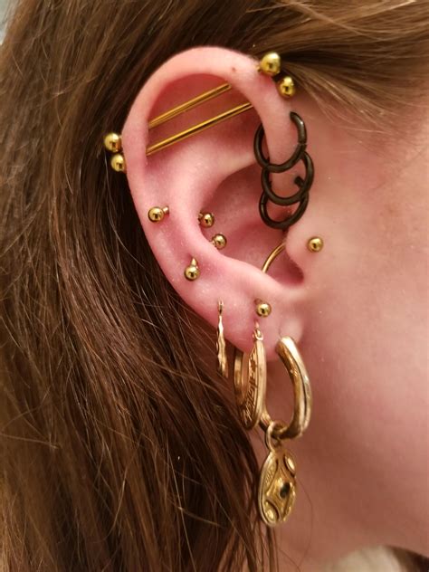 Double Forward Helix Piercing And Tragus