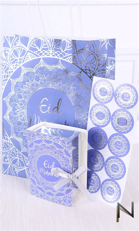 Sac cadeau en papier Eid Mubarak bleu nuit avec décorations argentées