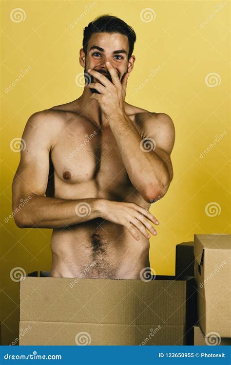 Man Standing Naked Among Cardboard Boxes Sexuality And Delivery