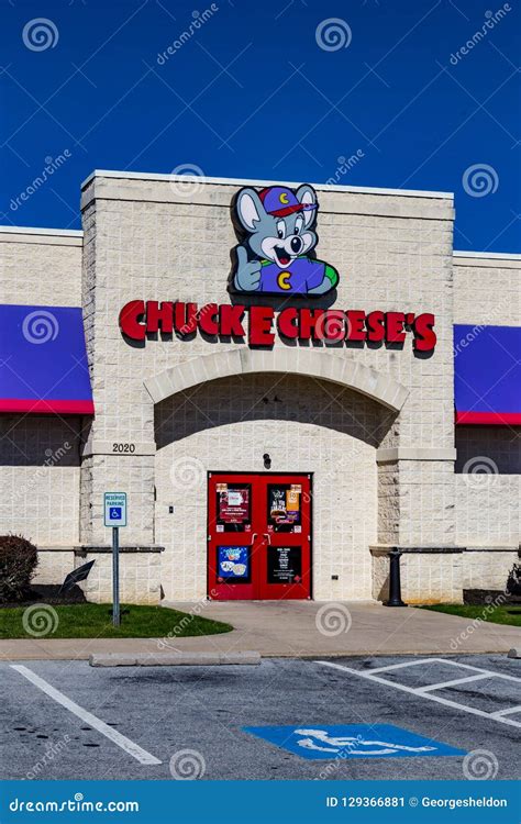 Chuck E Cheese Sign Above The Entrance To Restaurant Chuck E Cheese