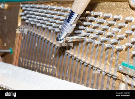 Detailed view of Upright Piano during a tuning Stock Photo - Alamy