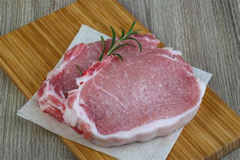 Raw pork steak 12284479 Stock Photo at Vecteezy