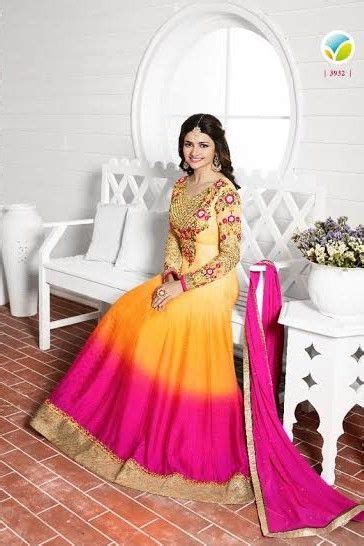 Attractive Prachi Desai Long Anarkali Style Dress In Yellow And Rani