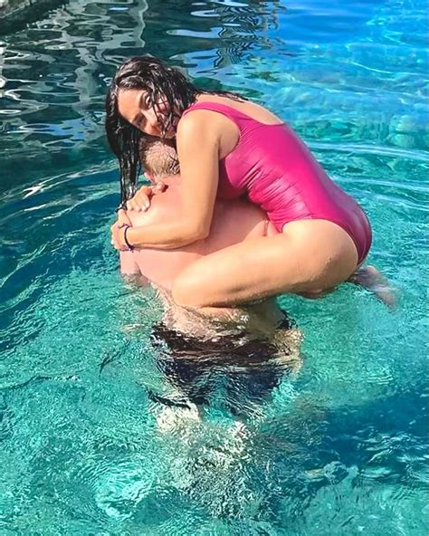 Salma Hayek Strips Down Takes Dip In Hot Pink Bathing Suit