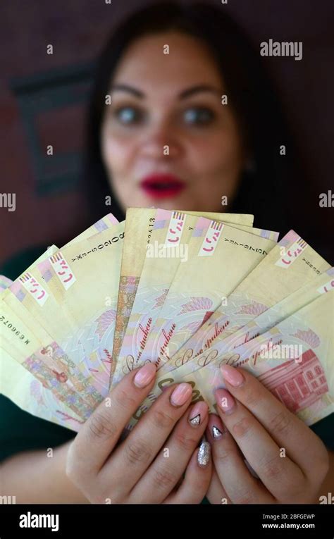 Brunette Caucasian Girl Portrait With Big Amount Of Ukrainian Money