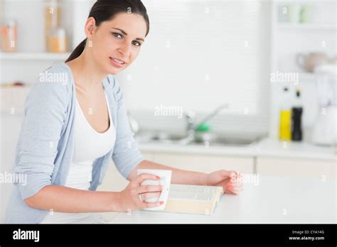 Brunette Reading A Book Stock Photo Alamy