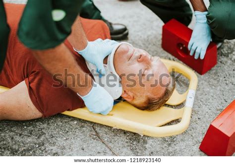 Paramedic Team Placing Cervical Collar Injured Stock Photo 1218923140