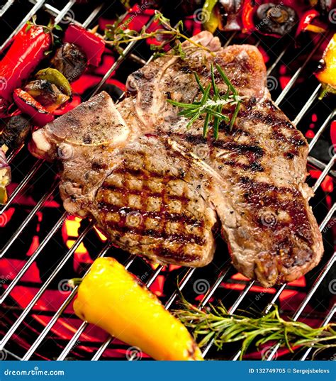 Beef T Bone Steaks On The Grill With Flames Stock Image Image Of