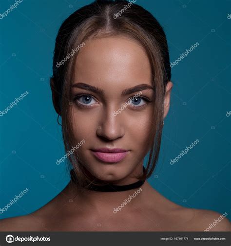 Portrait Of A Beautiful Woman With Blue Eyes Stock Photo By ©slava