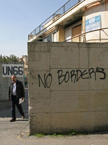 A Man Crosses From No Man S Land To The Old Area Of Nicosia Partition