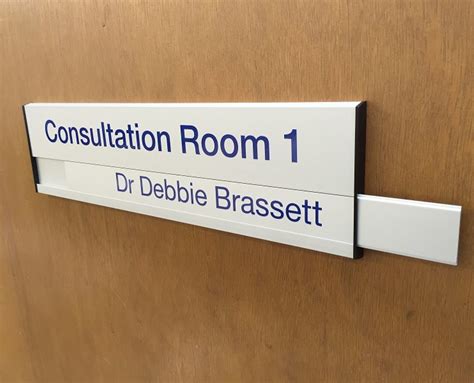 Interchangeable Door Sign Includes Removable Nameplate Insert