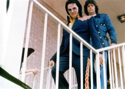 Elvis and Jerry Schilling make their way to the Civic Center in Monroe, LA for the 2:30 pm ...