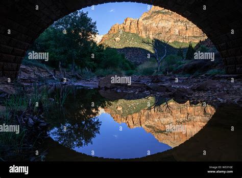 Reflections Under Virgin River Bridge In Zion National Park Utah