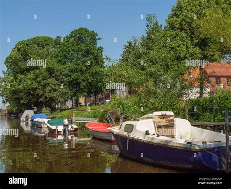 Boats On A River Stock Photo Alamy