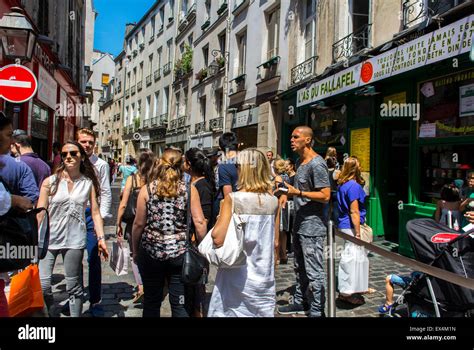 Paris France Crowd Scene People Walking Shopping On Busy Street City