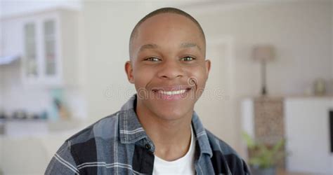 Portrait Of Happy African American Male Teenager With Short Hair At