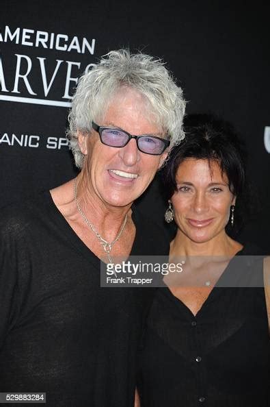 Musician Kevin Cronin And Wife Lisa Arrive At The Premiere Of Jobs