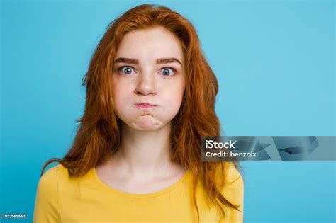 Headshot Portrait Of Happy Ginger Red Hair Girl With Funny Face Looking