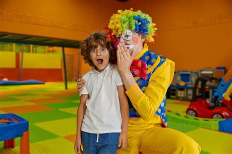 Portrait Funny Boy Child And Clown Animator At Indoor Playground Stock