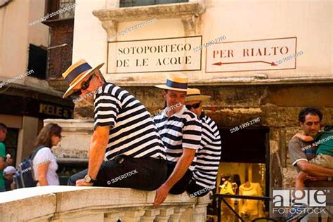 Three 3 Gondoliers in blue striped mariner shirts and straw boater hats ...