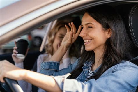 Premium Photo Girls Having Fun In The Car