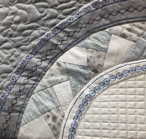 The Quilts Are Stitched Together To Create An Intricate Design On This