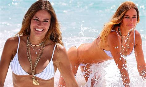 RHONY Alum Kelly Bensimon Gets Wet And Wild In Her Striped Bikini While