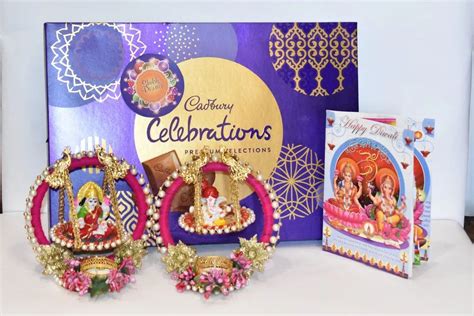 Multicolor Cardboard And Fabric Lakshmi Ganesh Swing Cadbury