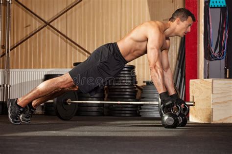 Push Up On Kettlebells In A Gym Stock Photo Image Of Kettlebells