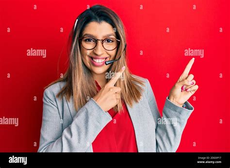 Beautiful Brunette Woman Working At The Office Wearing Operator Headset