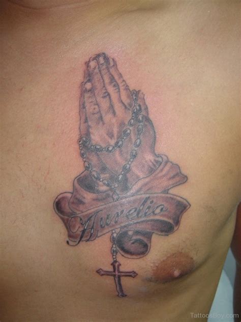 Praying Hands Tattoo On Chest Tattoos Designs