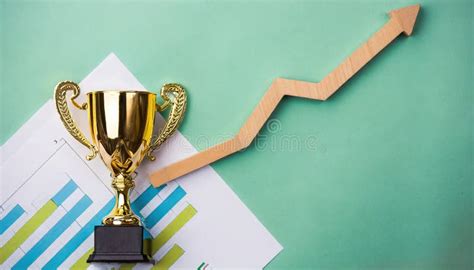 gold trophy  top  financial graphs   arrow pointing  stock