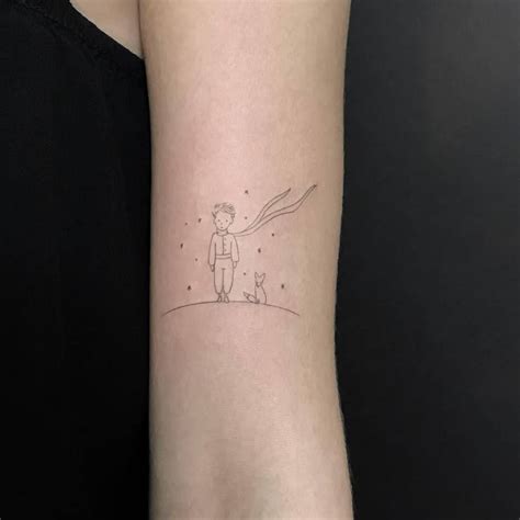 fine  style  prince inspired tattoo   left bicep