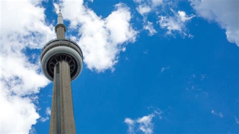 Glass falls from CN Tower as heavy winds hit Toronto | CBC News