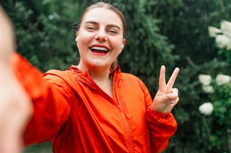 Lovely Happy 30s Girl Posing With Peace Sign Laughing Caucasian Young