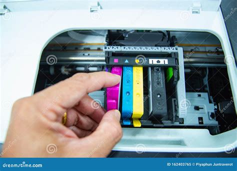 Technicians Are Install Setup The Ink Cartridge Of A Inkjet Printer The