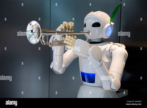 A White Humanoid Trumpet Playing Toyota Partner Robot On Display At