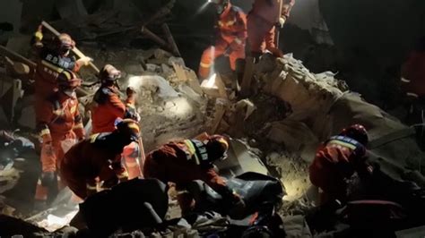 Rescue workers in China search for survivors in freezing temperatures ...