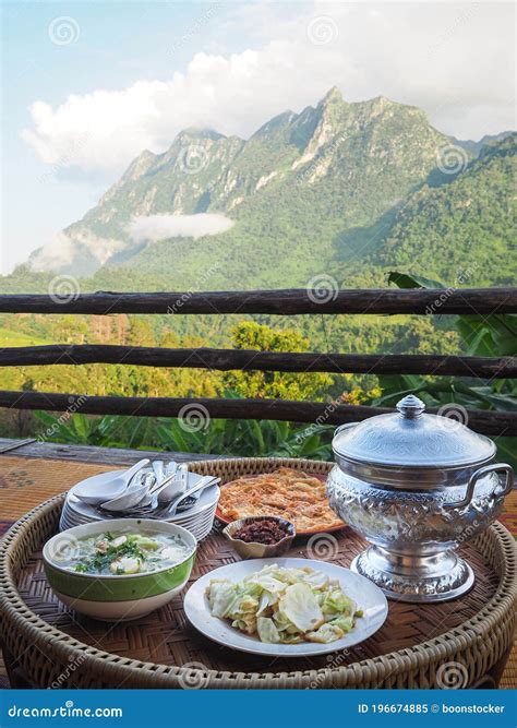 Side View Of Thai Foods Traditionally Dinner With Mountains Background