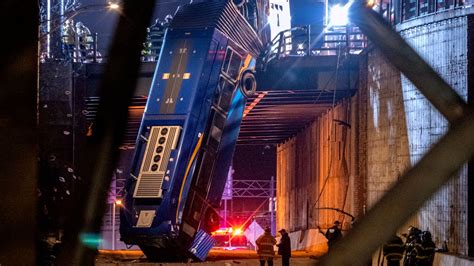 New York bus crash: Nine injured after vehicle plunges 49ft off bridge ...