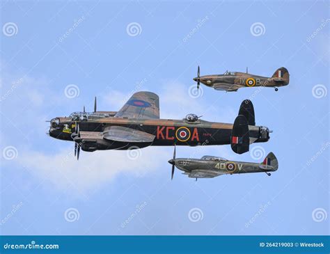 View Of Lancaster Spitfire And Hurricane Of The Bbmf Flying In The