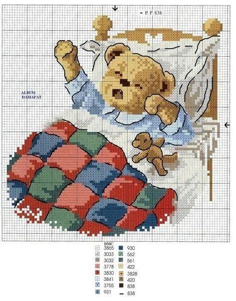 The Cross Stitch Pattern Shows A Teddy Bear Laying In Bed With A