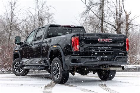 Rear View Of A Black 2020 Gmc Sierra Pickup Truck In The Snow Editorial