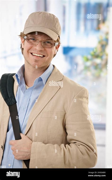 Young Businessman Leaving Office Stock Photo Alamy