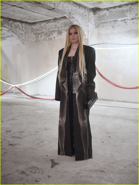 Avril Lavigne Tyga Coordinate In Long Black Jackets At Y Project Show