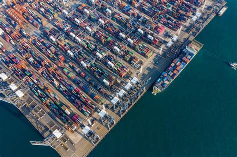 Premium Photo High Angle View Of Commercial Dock By Sea Against