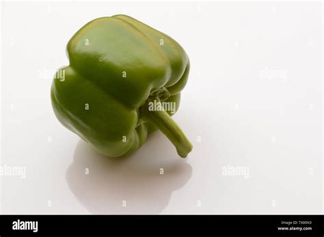 Fresh Green Capsicumshimla Mirch Isolated On A White Background Stock