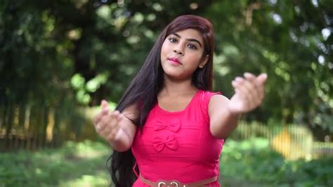 A Beautiful Hot Asian Romantic Girl Is Calling To The Camera By Spreading Arms Calling For A