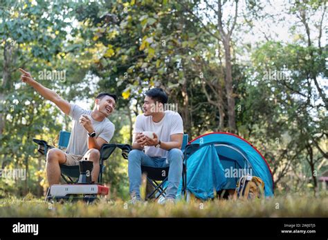 Male Gay Couple Asian Traveling With Tent Camping Outdoor And Various