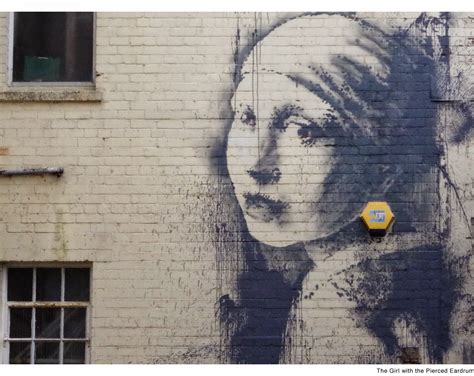 Banksy Paints The Girl With Pierced Eardrum At The Dockside Studios